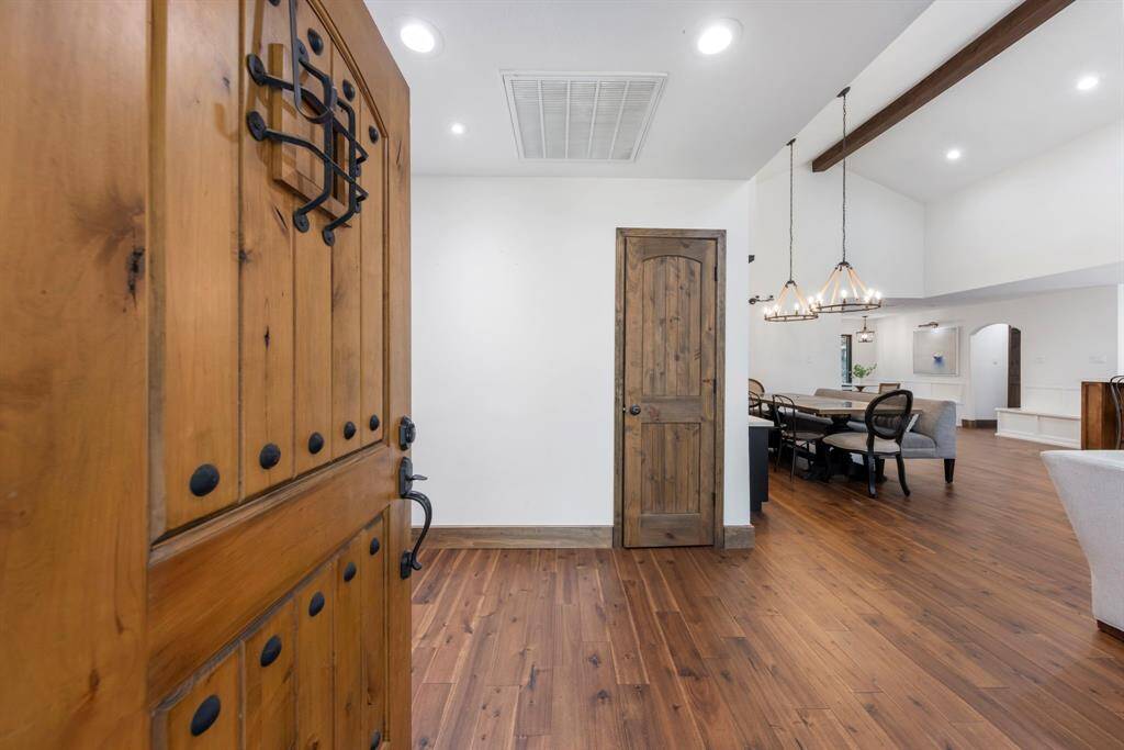 Inviting rich hardwood floors throughout home.