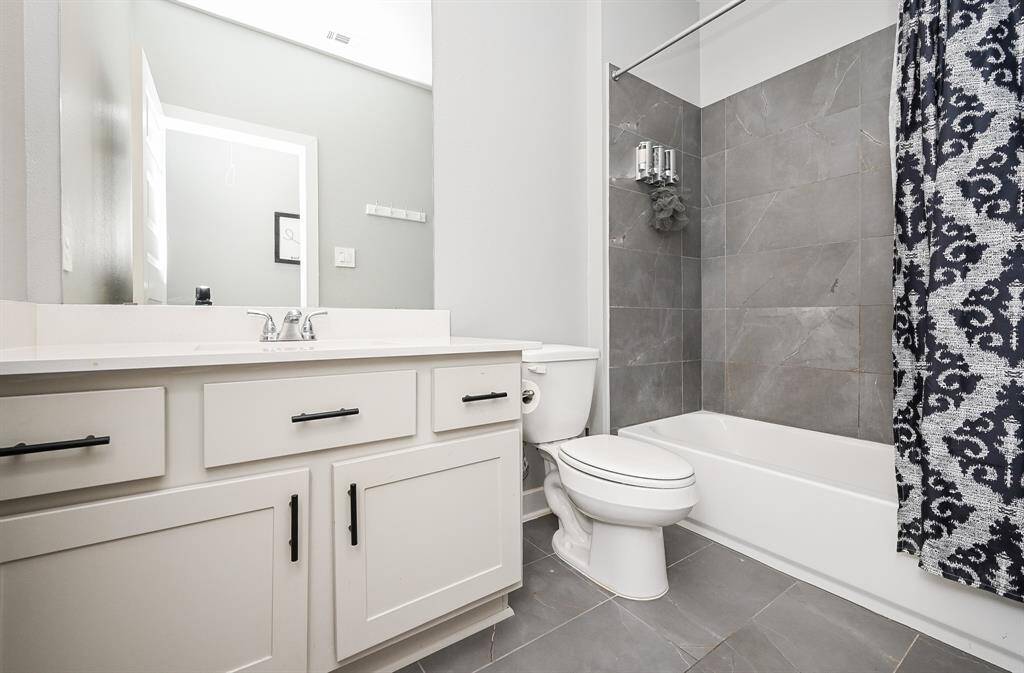 Another full bath offers refreshing comfort.