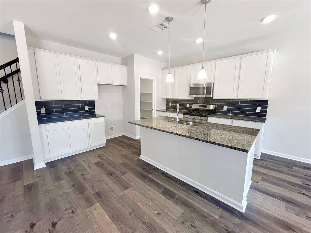 The Oriole II- Kitchen. Home under construction, photo used for illustrative purposes only, colors and options will vary.