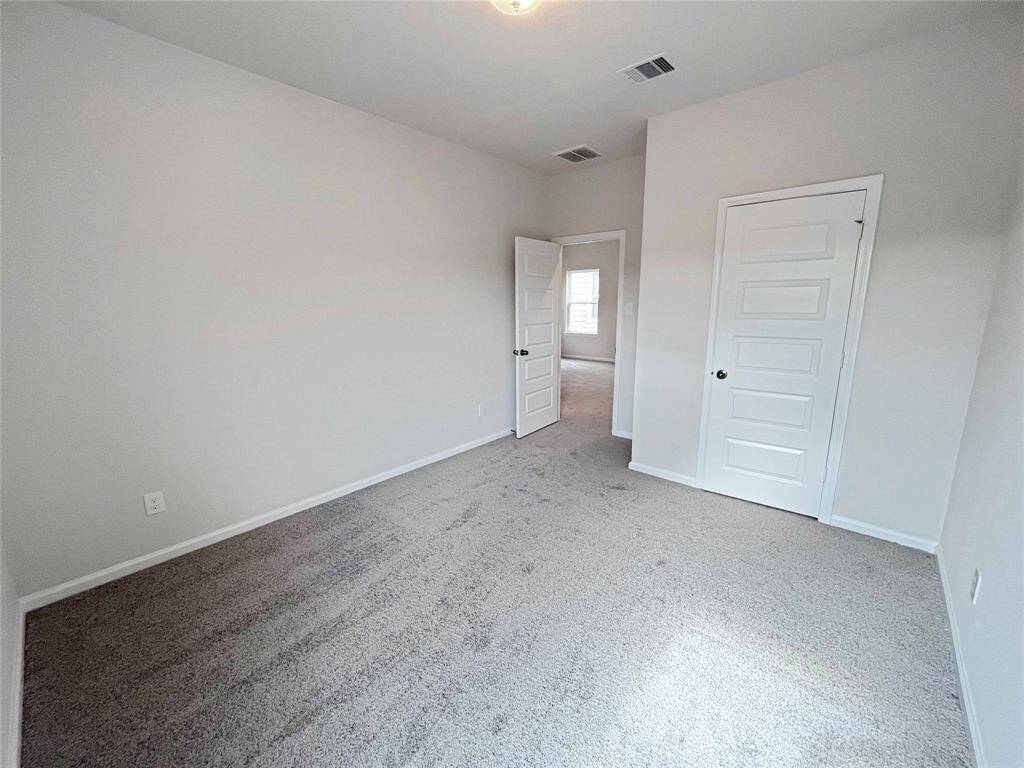The Robin II- Secondary Bedroom 2. Home under construction. Sample floor plan photo used for illustrative purposes only. Upgrades, selections options, windows and colors may vary.