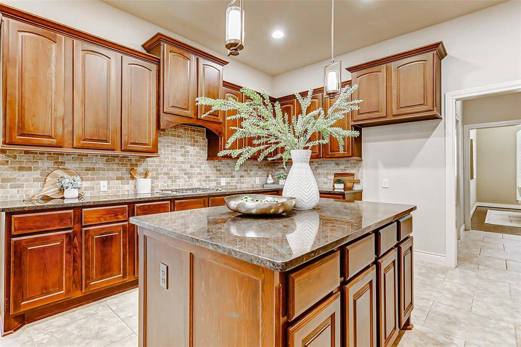 The oversized island gives you plenty of space for prepping and serving.