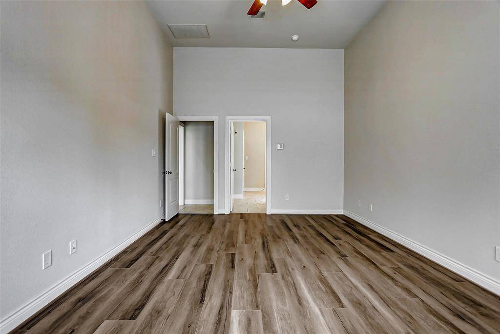The primary bedroom is located at the back of the home, giving it privacy from the rest of the rooms.