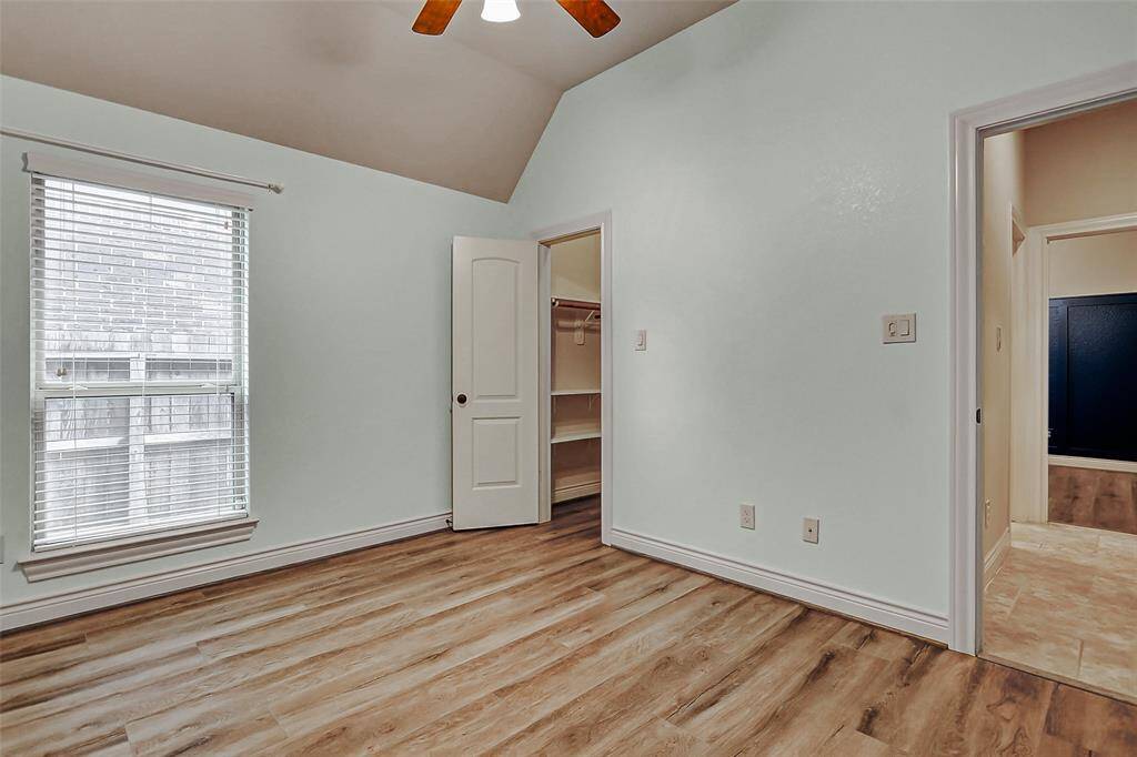 The secondary bedroom has a walk-in closet.