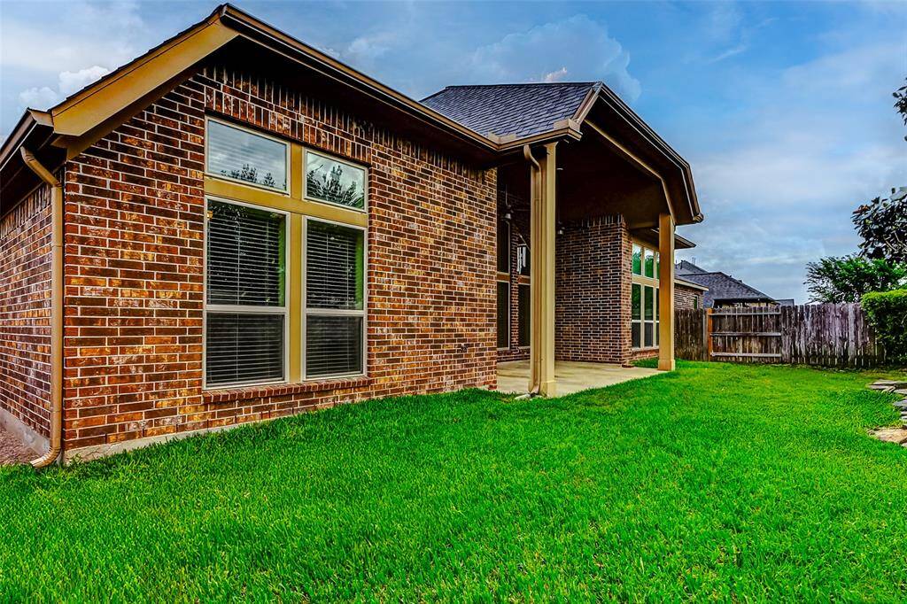 Lush grass with space for play.