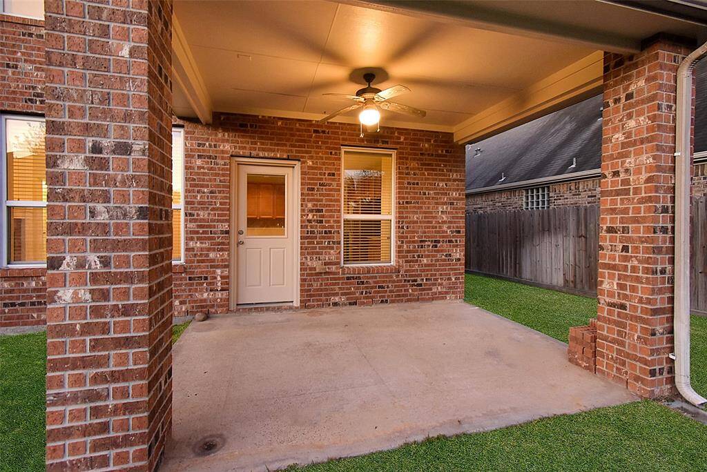 Cozy covered patio perfect for outdoor relaxation.