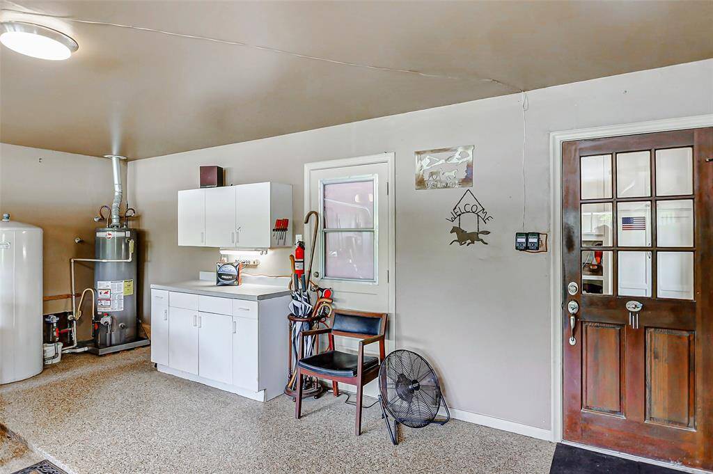 The garage houses the well and gas water heater.