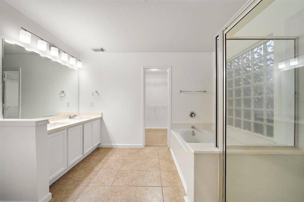 With walk in shower and bathtub