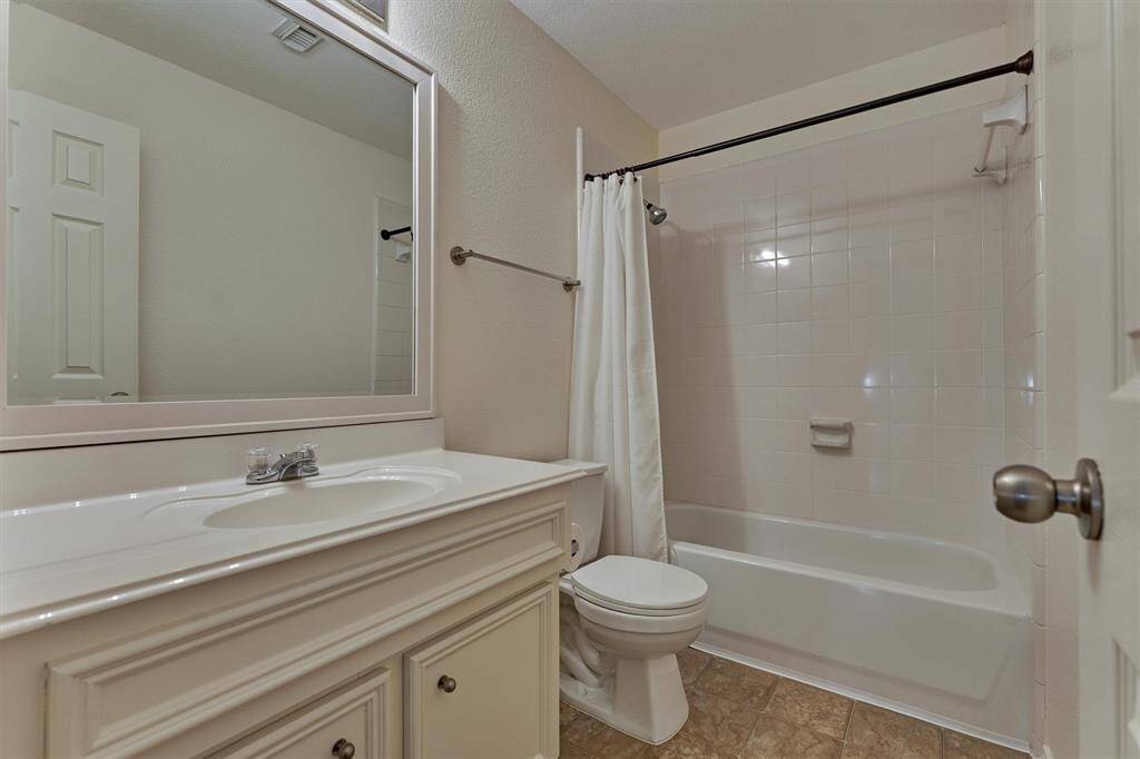 The second full bath upstairs has a tub/shower combination.