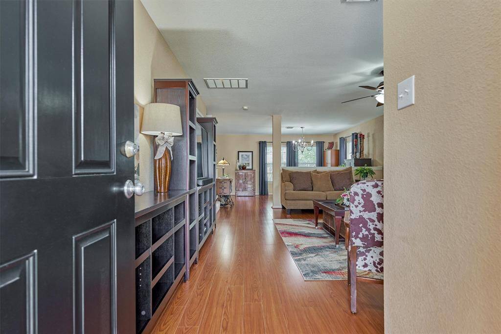 Easy care laminate and vinyl flooring in throughout the main level.