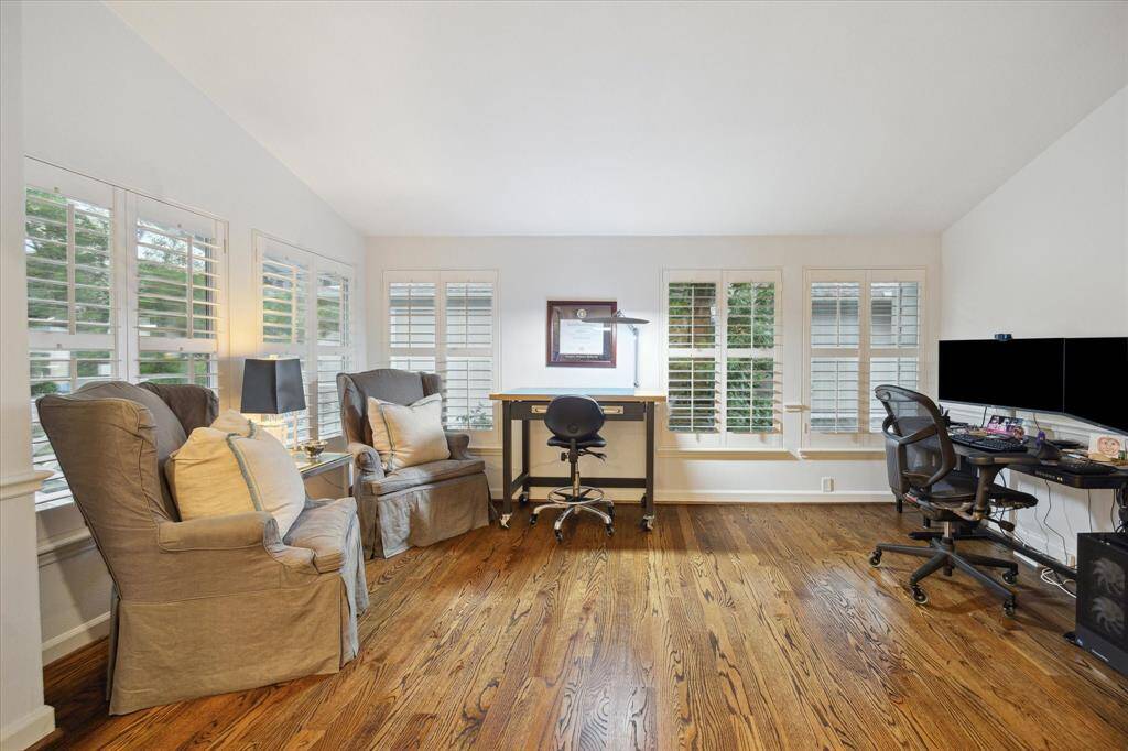 Primary study can be arranged a multitude of ways.  As of note the Plantation Shutters on the north and west windows can channel the light any which way you'd like.