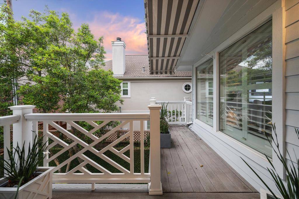 Off of the Primary and with views from the study, this outside Balcony has Treck Decking, Chippendale railing and Sunbrella canopy.