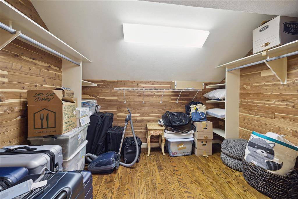 Very large Cedar closet for storage off of the Game Room with hanging space and ample shelving.  The perfect spot for storing large and small items.