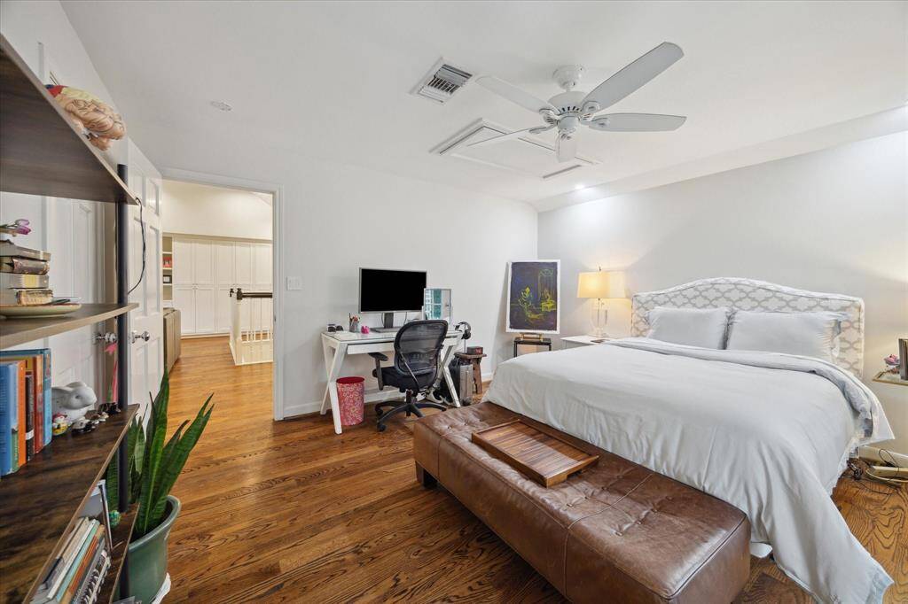 Fourth bedroom with full bath, large walk-in closet, private balcony with access to yard.  Perfect space for a little privacy or separate access for a Nanny.