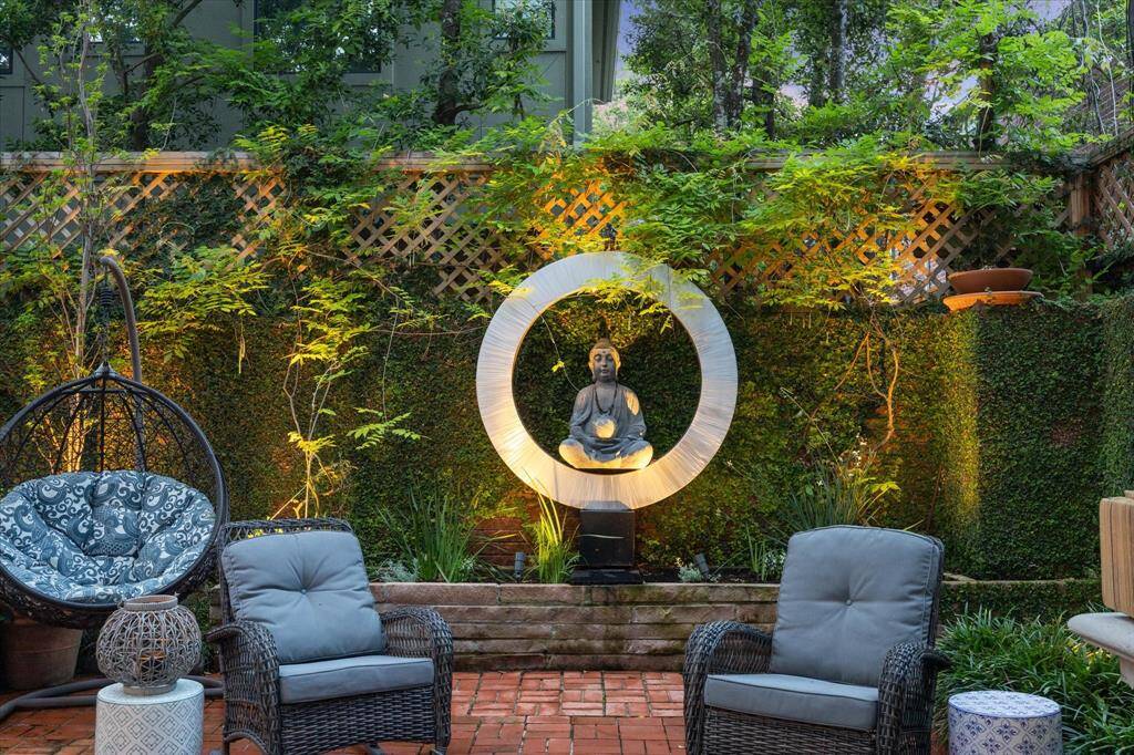 Peaceful and serene!  Lush landscape and detail lighting set the mood for a nice relaxing outside experience.