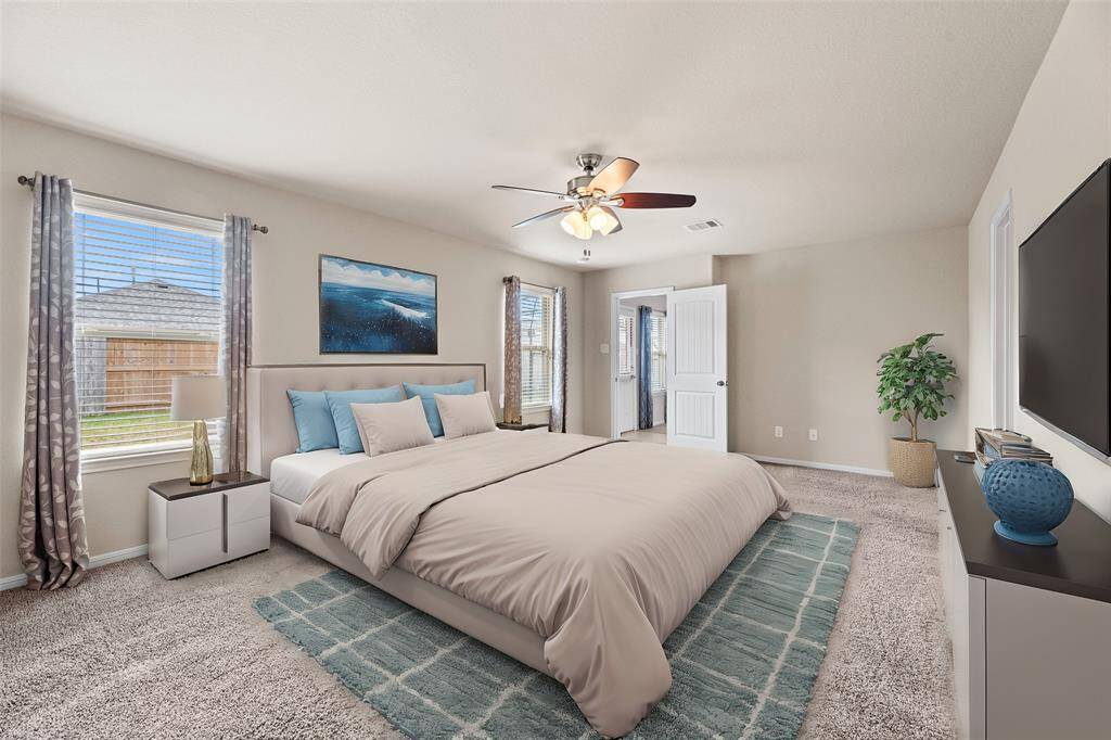 How perfect is this primary space? Spacious and bathed in natural light, promising pure relaxation.
