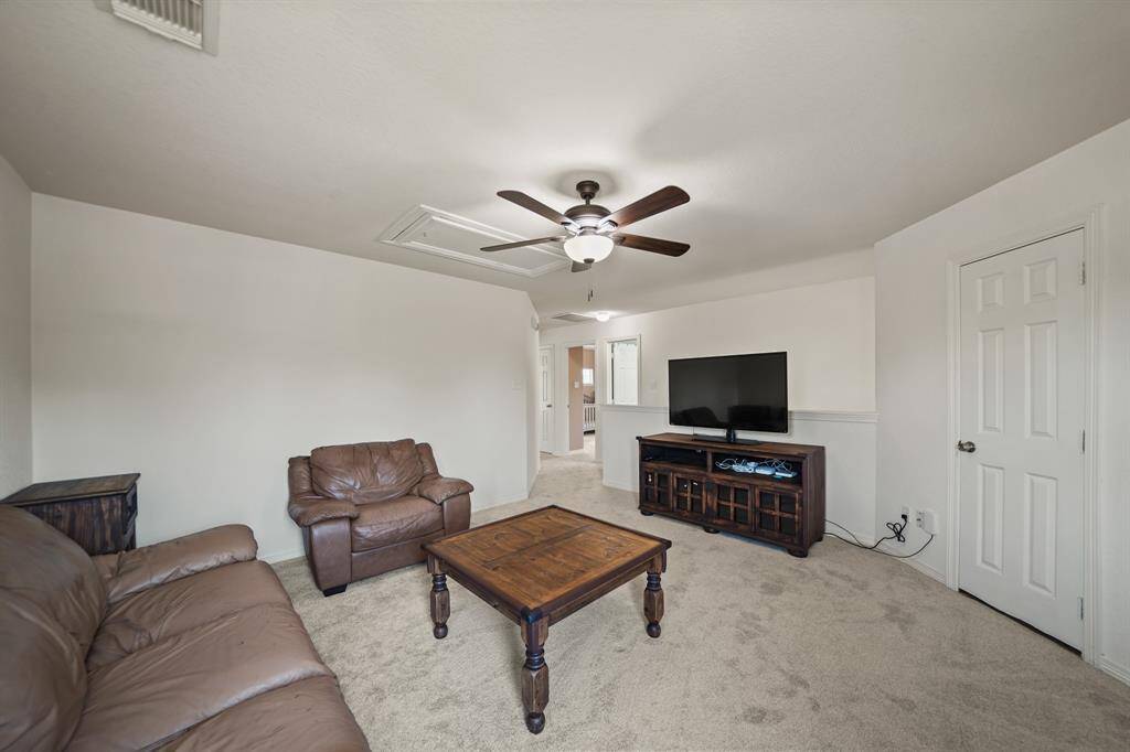 Perfect as a game room, this flexible space could easily serve as a second floor living area, child's play area, etc.