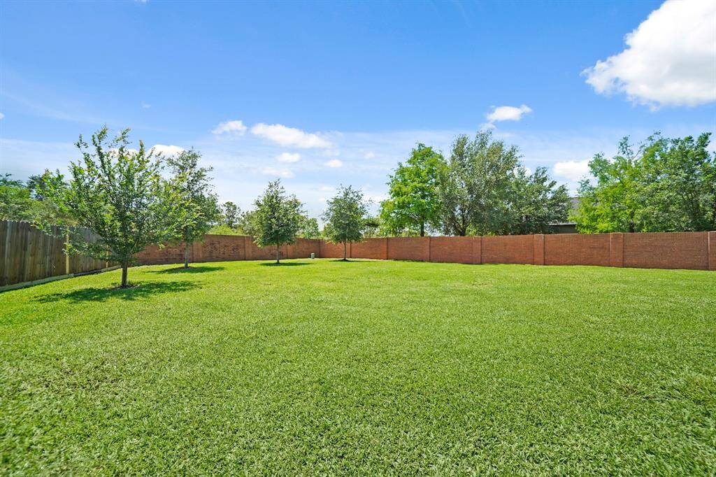 Enjoy the peace, tranquility and privacy of this spacious backyard with no neighbors behind!