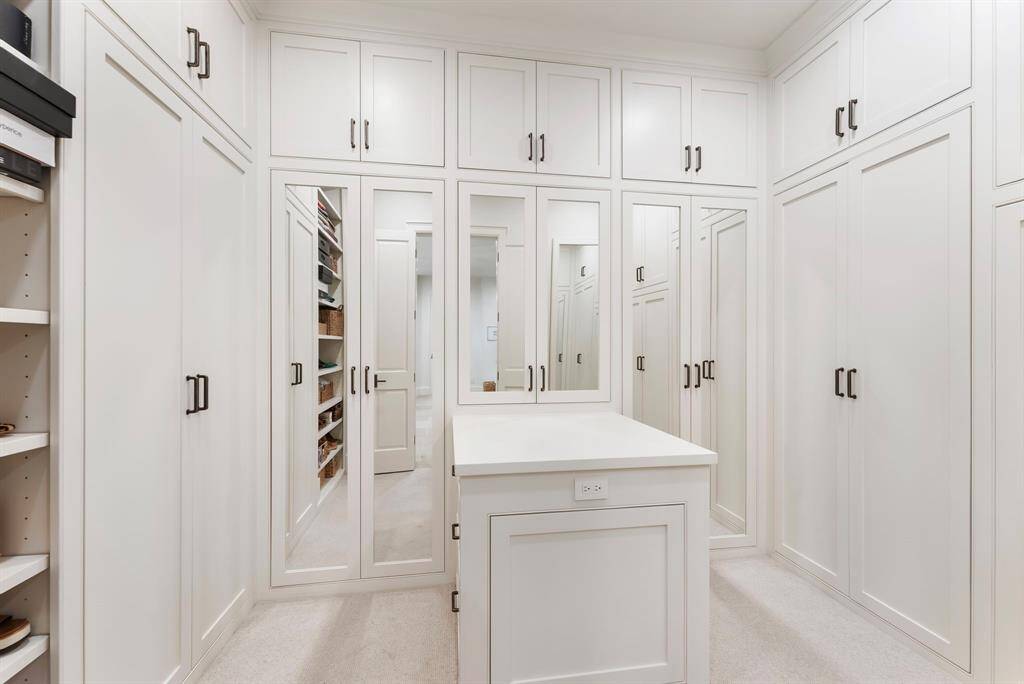 Enjoy the convenience of two custom walk-in closets, thoughtfully designed with ample storage and organization in mind.