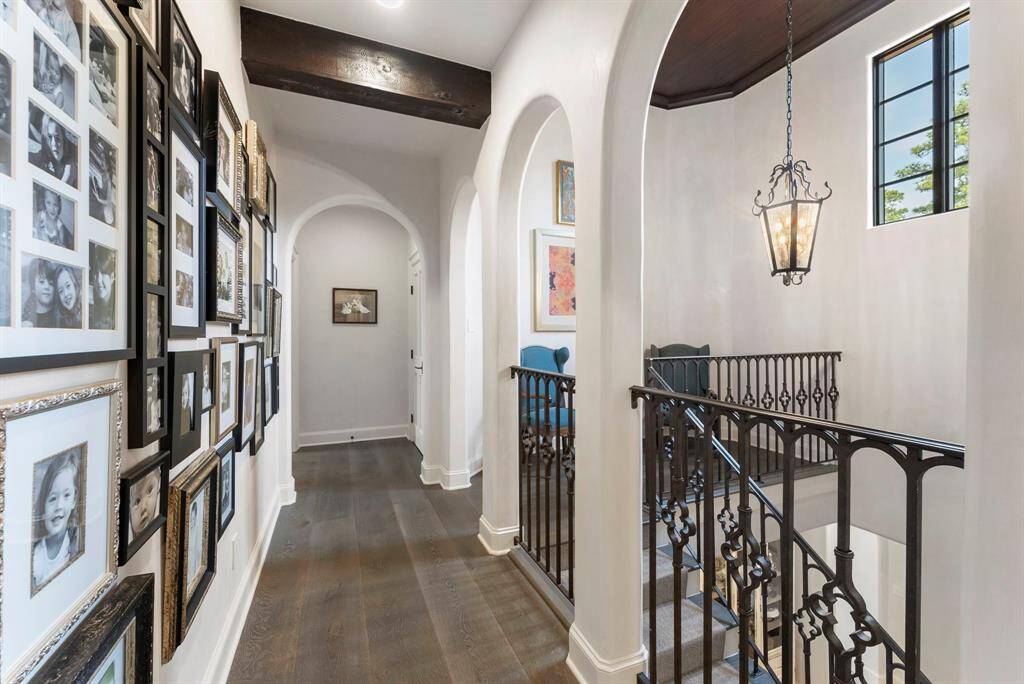 Upstairs, you'll discover three generously sized guest bedrooms, complemented by two full bathrooms.