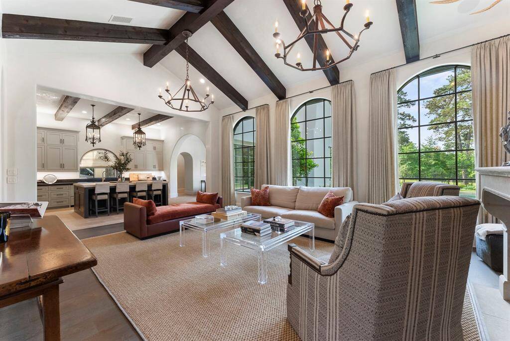 The family room flows seamlessly into the kitchen, creating a connected and inviting space for everyday living and entertaining.