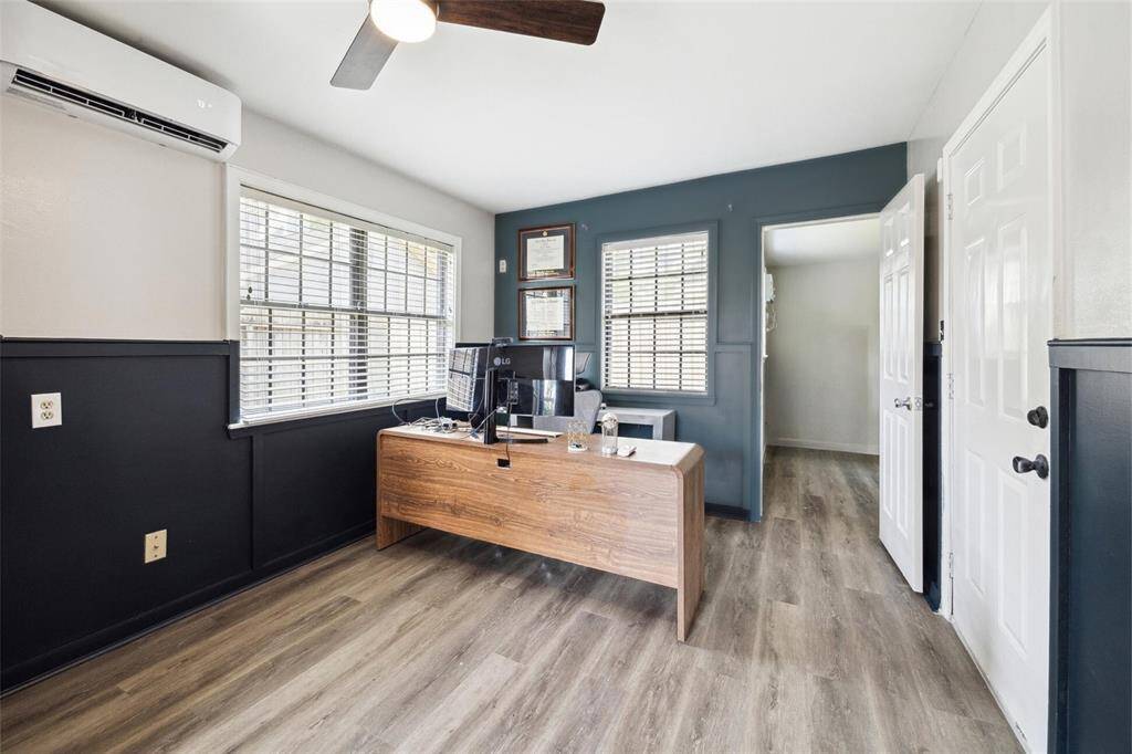 Garage apartment "living room" is currently being used as an office.