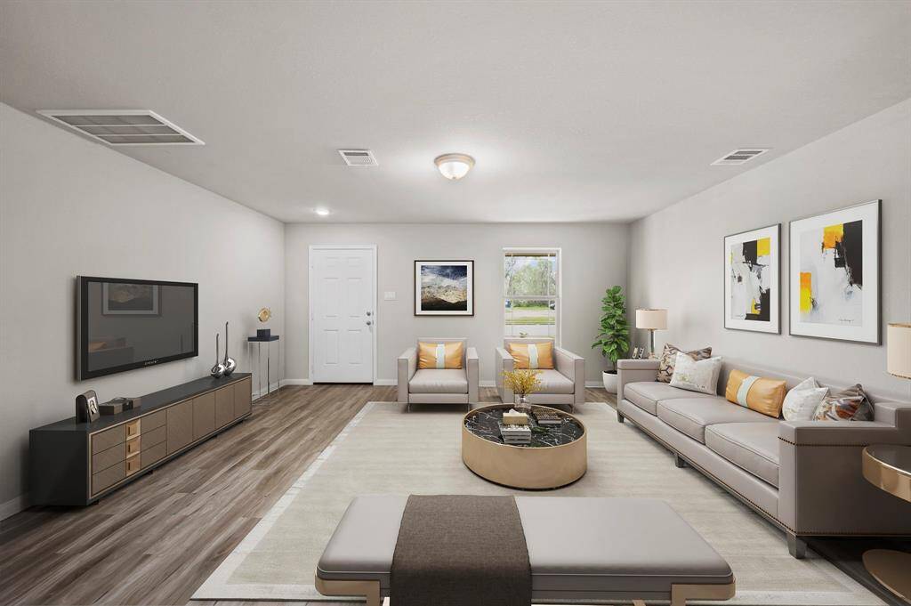 STAGED living area with vinyl flooring and dimensions of approximantely 17'-3" x 15'-6"