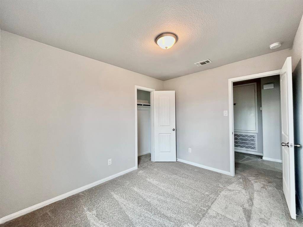 STAGED bedroom upstairs with carpet
