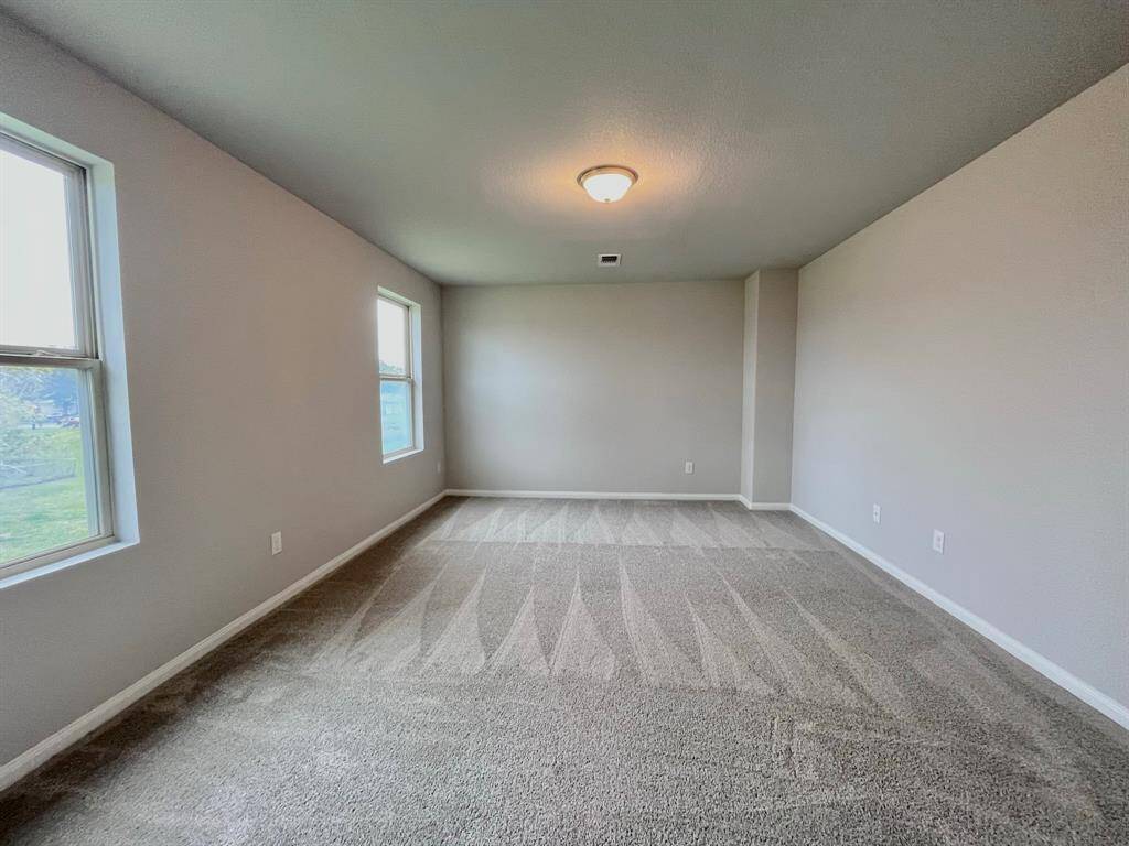 STAGED bedroom upstairs with carpet