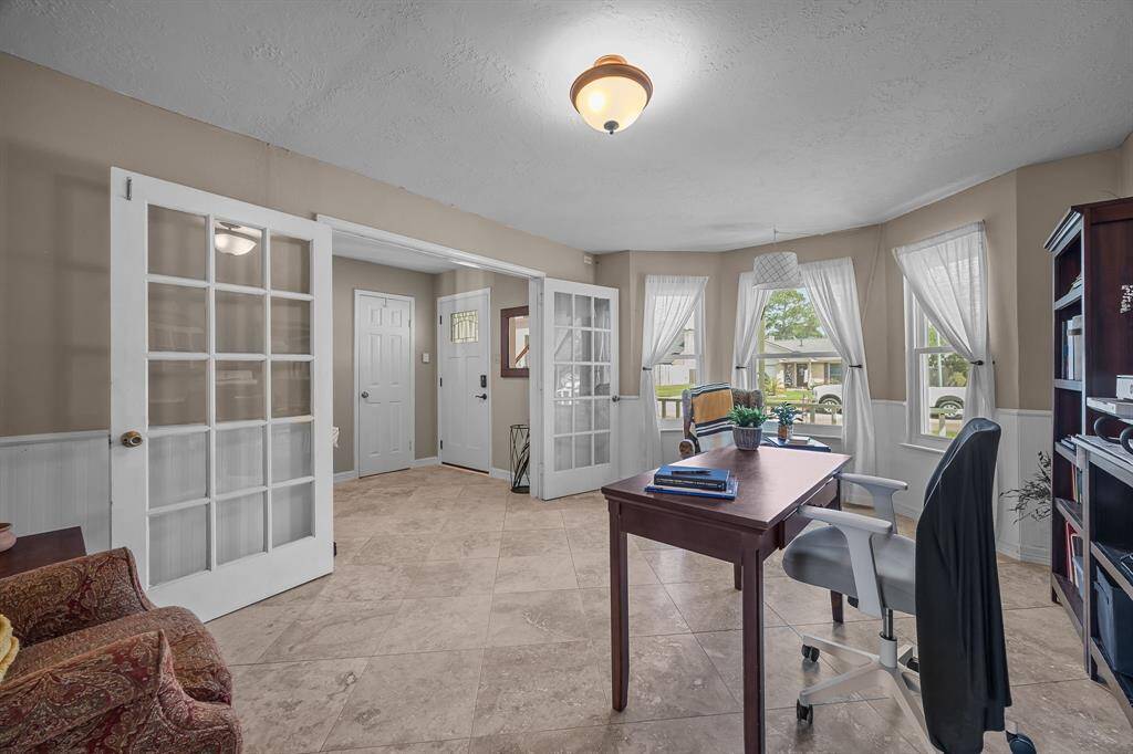 Formal Dining/Home Office with beautiful Bay Windows