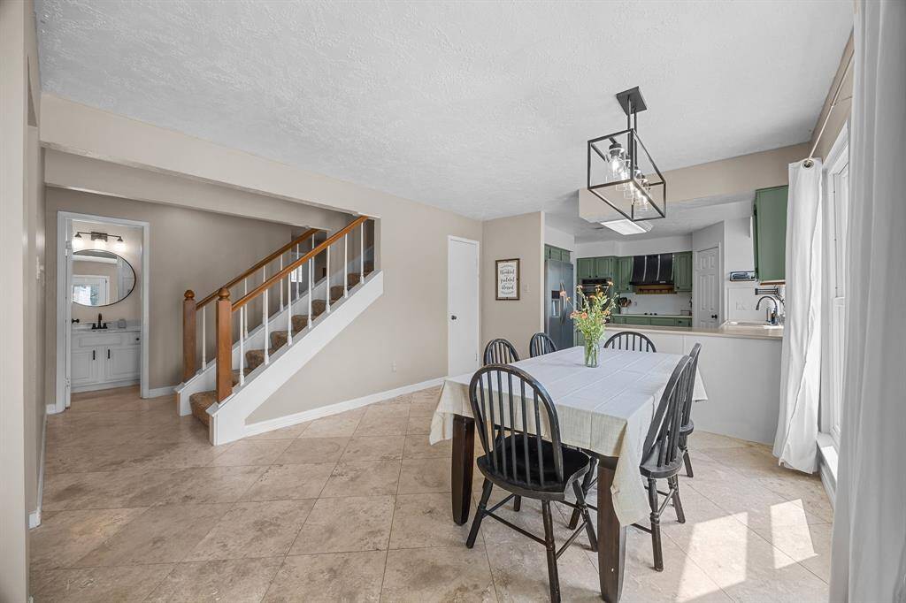 View toward stairs and powder room