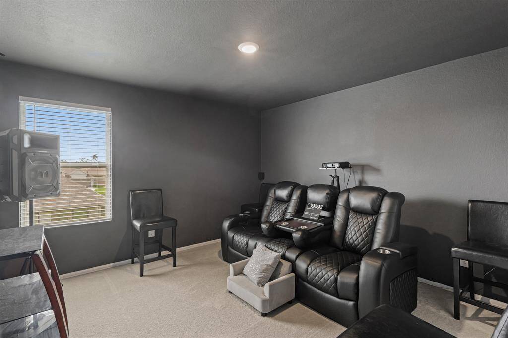Secondary bedroom which offers great size for a home theatre!