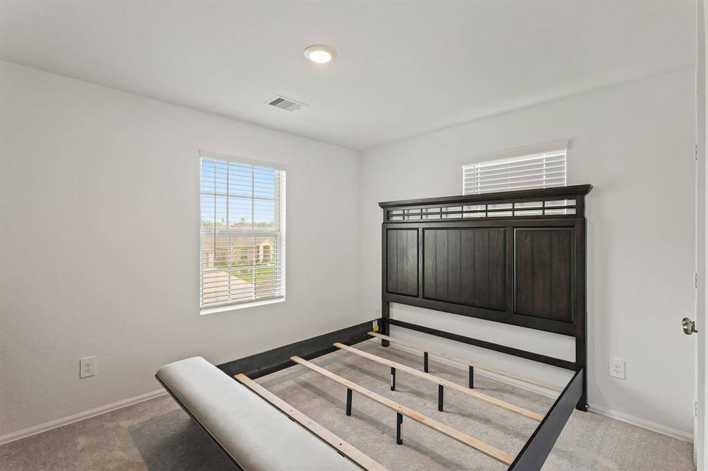 Secondary upstairs bedroom (5th), large enough to fit a king bed!