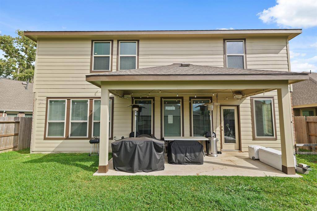 Oversized covered patio and plenty of windows offering a plethora of natural light!
