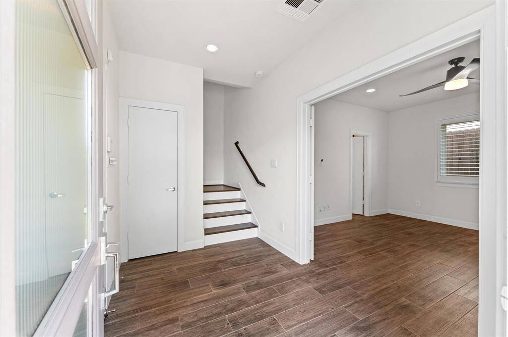 Entry office/bedroom 1 to the right, garage entry to the left