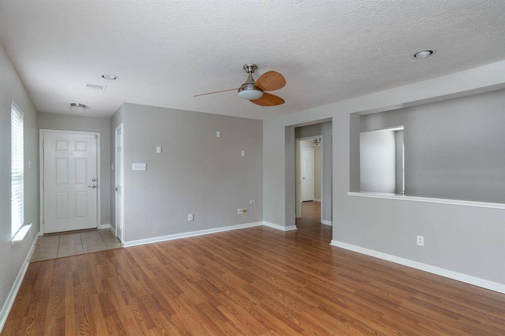 Wood-look laminate floors, neutral paint, updated light fixtures & blinds on all windows!