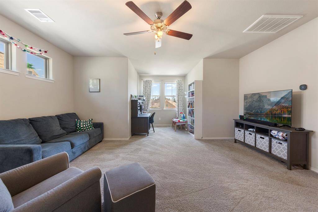 This game room has plenty of space for a play room, study, extra living space, media - whatever you need!