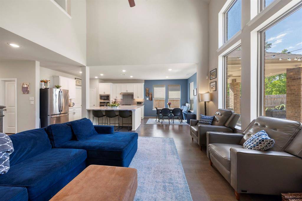 Designed with family living in mind, the open-concept main level seamlessly blends comfort and functionality.