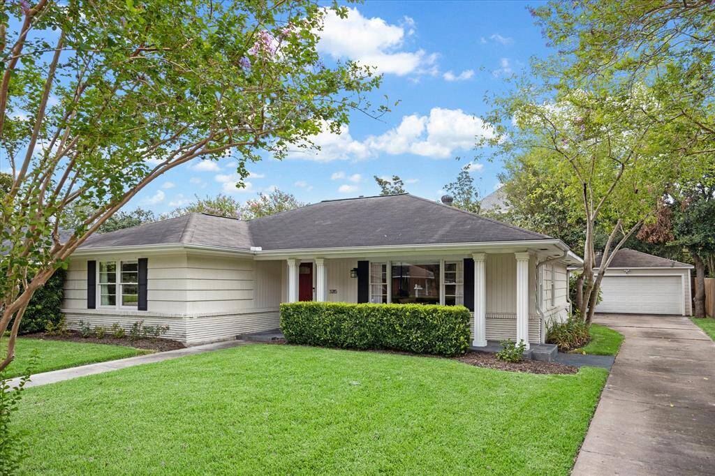 Detached 2 car garage in the back. nice covered front porch in front