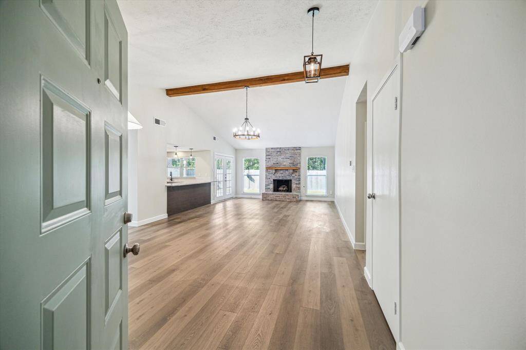 Vinyl plank flooring runs throughout the house
