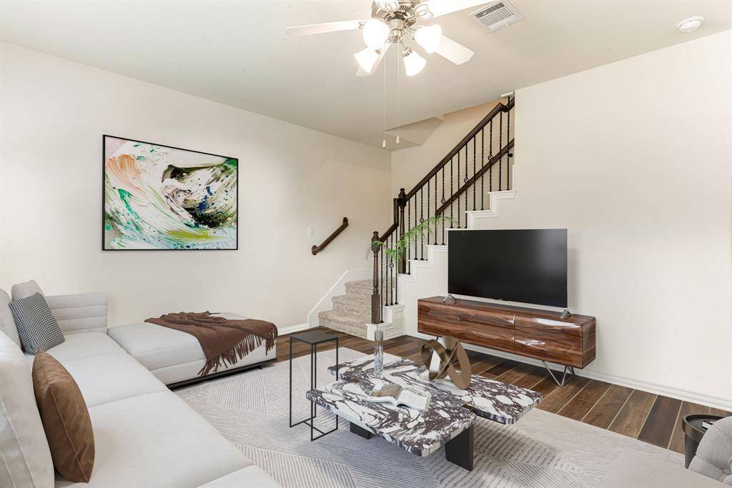 Spacious and inviting, this main living area features stylish finishes, natural light, and an open layout, perfect for relaxing evenings or entertaining guests. A beautiful blend of comfort and modern design awaits! *Virtually Staged