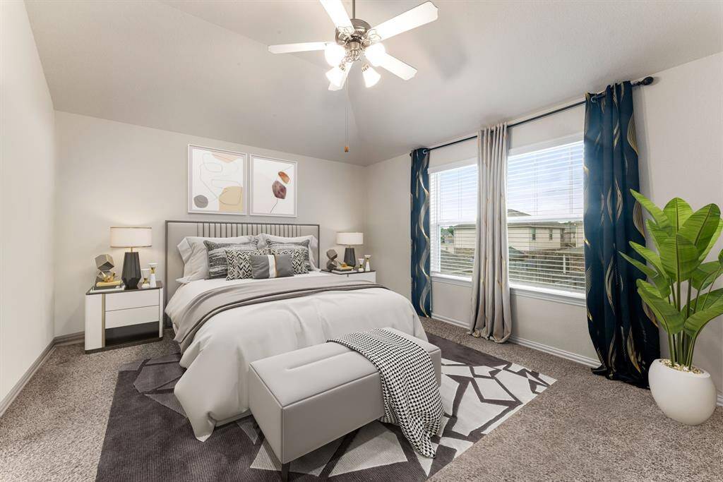 What a wonderful place to come home to, this stunning primary suite greets you with plush carppet, a warm custom paint, high ceiling, ceiling fan with lighting, lovely windows with blinds allowing in natural light brightening up this spacious primary bedroom, with extra space for a seating area. *Virtually Staged