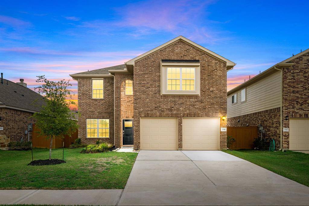 Welcome home to 32946 Silver Meadow Way located on a street in Vanbrooke and zoned to Lamar Consolidated ISD! This stunning home has lovely curb appeal, a well-manicured lawn, beautiful landscaping, brick elevation, dark stained front door, covered front porch, traditional style, and a double wide driveway!