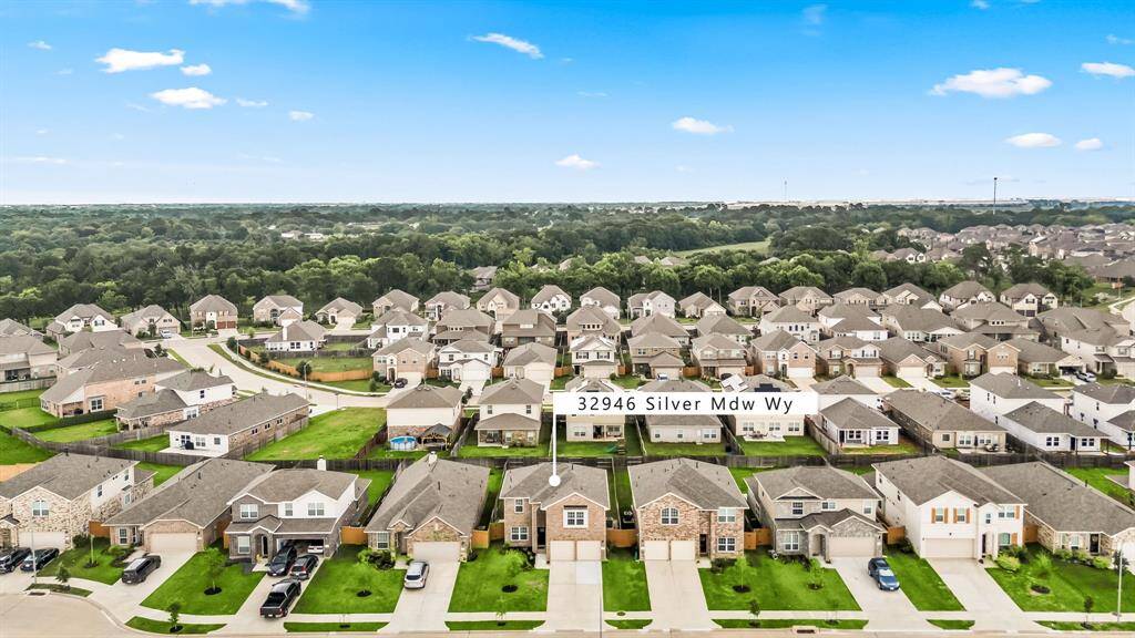 Amazing aerial shot of this beautiful home situated on a quiet street in the sought after community of Vanbrooke zoned to Lamar Consolidated ISD. Lush landscaping, well manicured front lawn and a wonderful back patio perfect to set up.
