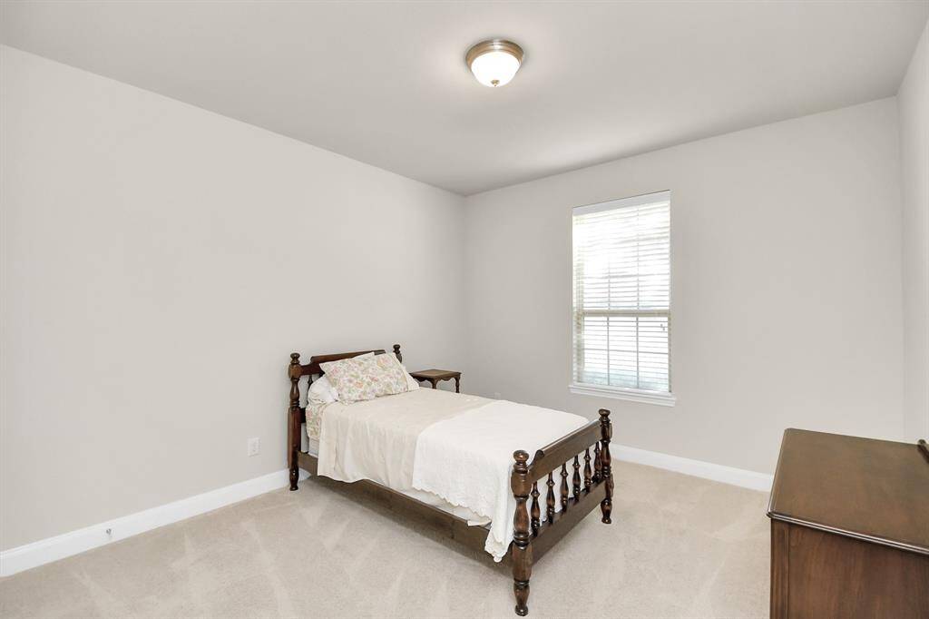 This front bedroom is perfect for guests.