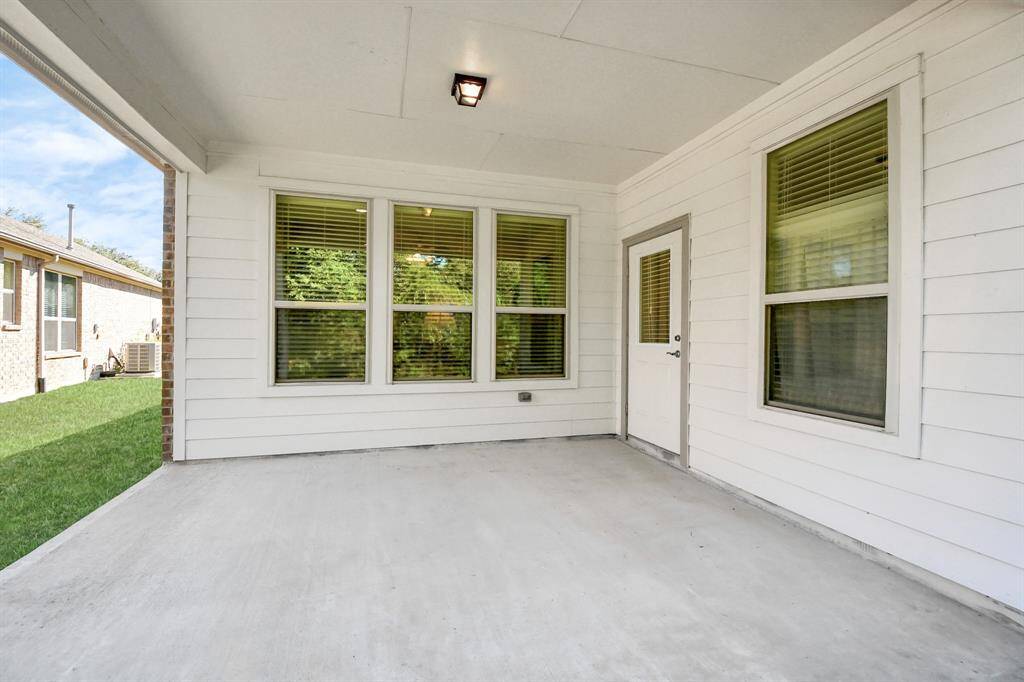 Take a look at the large covered back patio providing ample shade.
