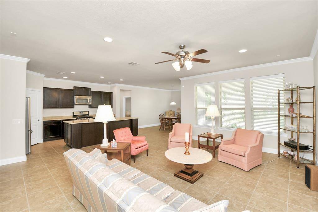 The living room is open to the kitchen