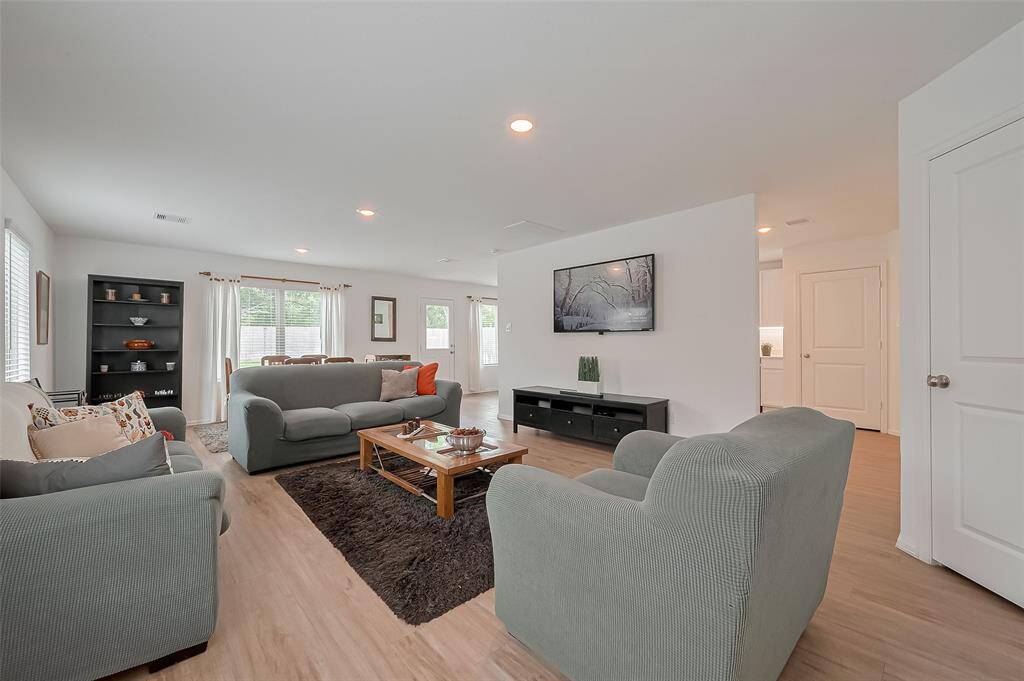 Large windows that fill the space with natural light and offer lovely outdoor views.