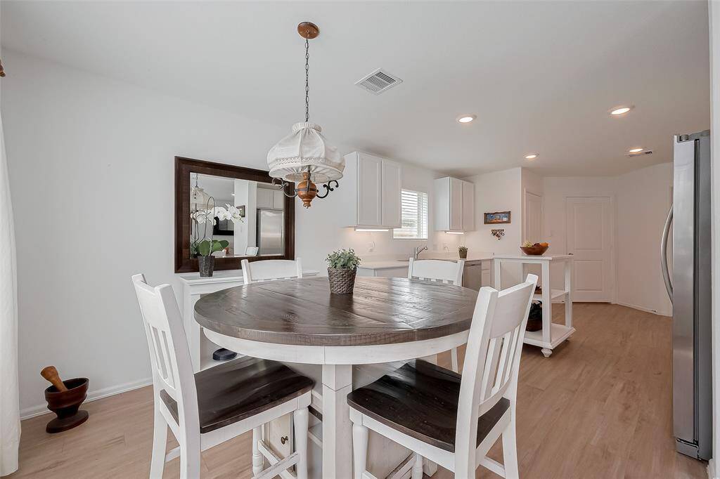 Dining area integrated with the family room for a spacious, open feel.