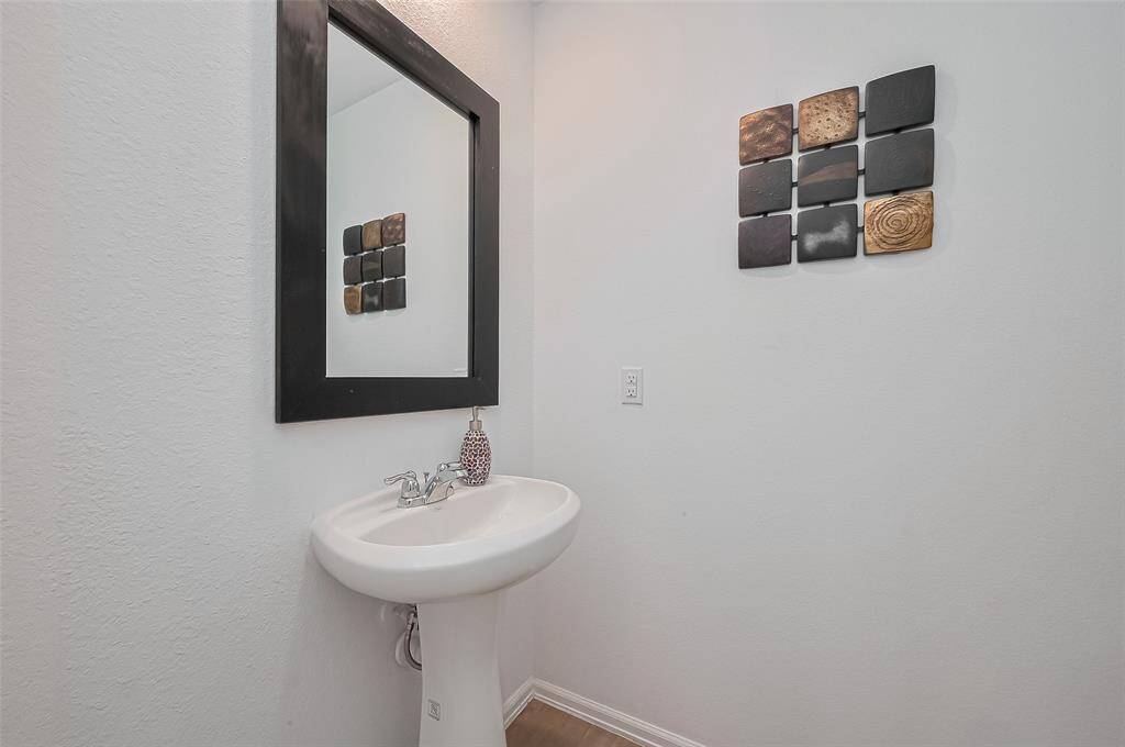 Convenient powder room with a clean design.