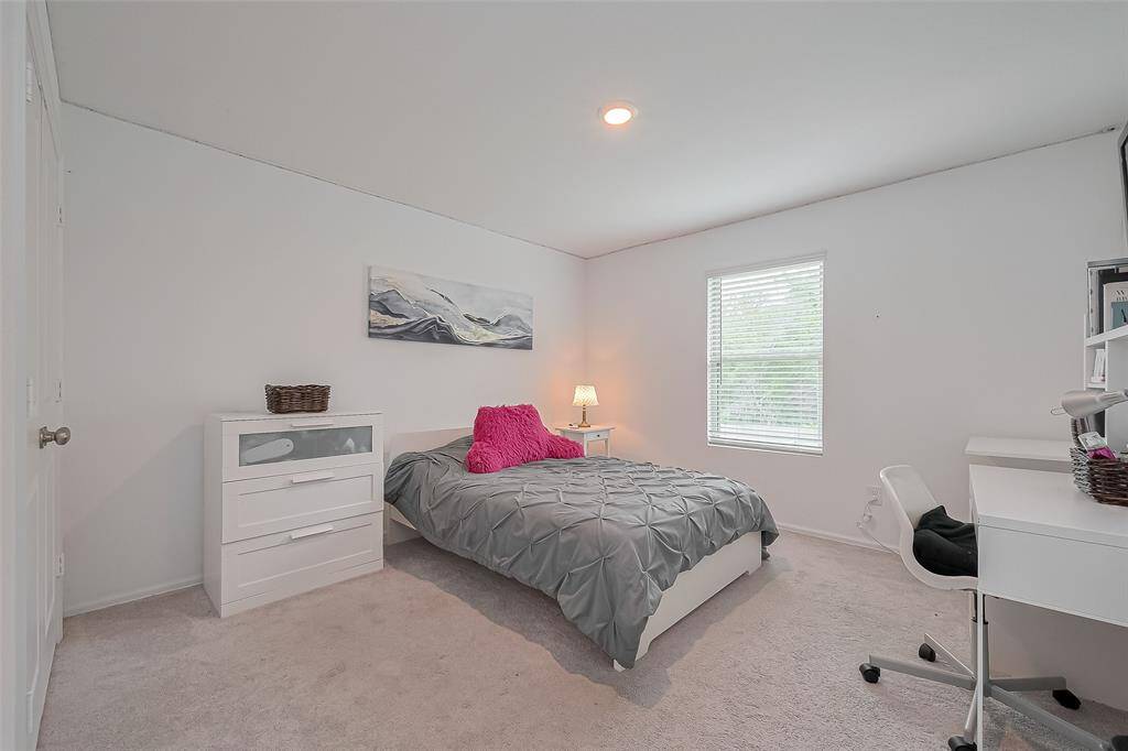 Cozy and spacious third bedroom — perfect for family or guests.